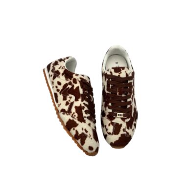 Duffy: mielettömän makiat sirolinjaiset lehmäkuosi tennarit